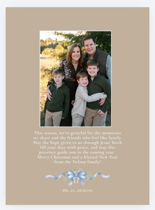 Coordinating taupe Christmas card back with family photo, personal message and blue bow