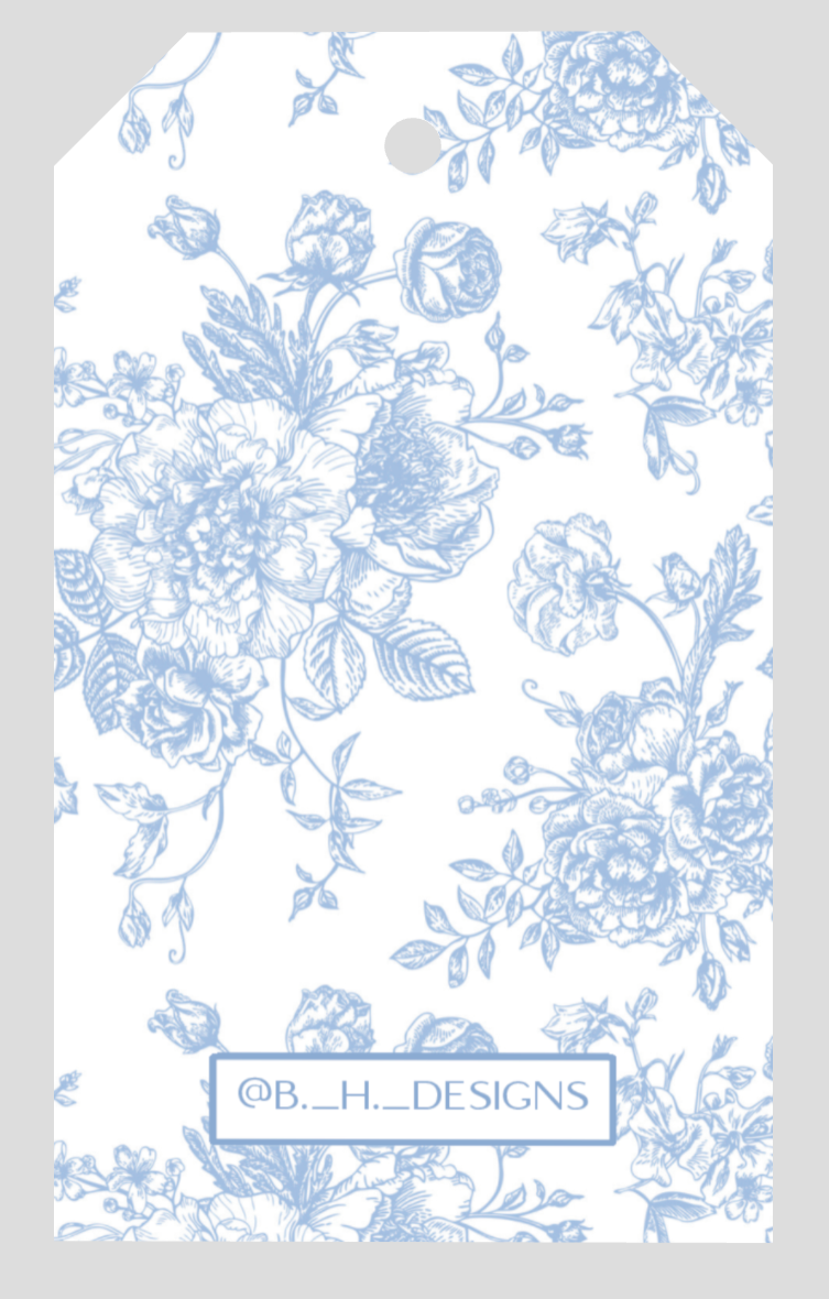 Coordinating light blue floral pattern on vine monogram gift tag