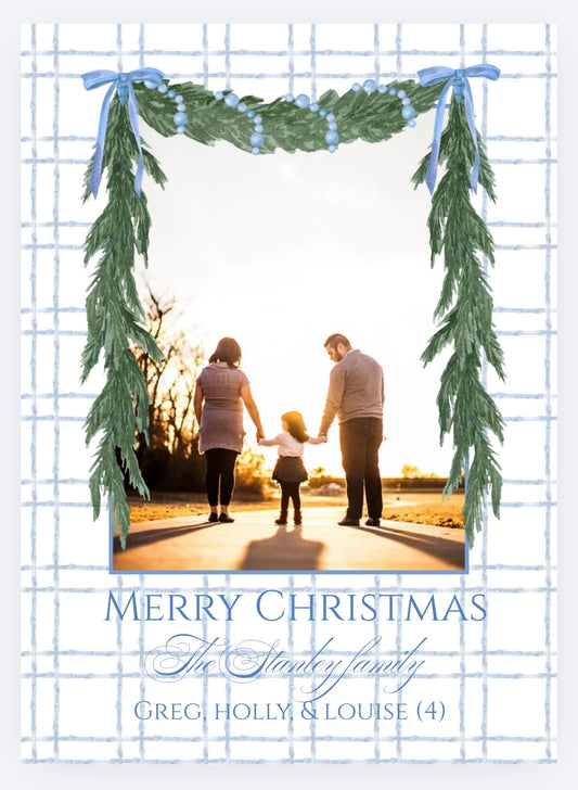 Blue bow and evergreen garland photo Christmas card front