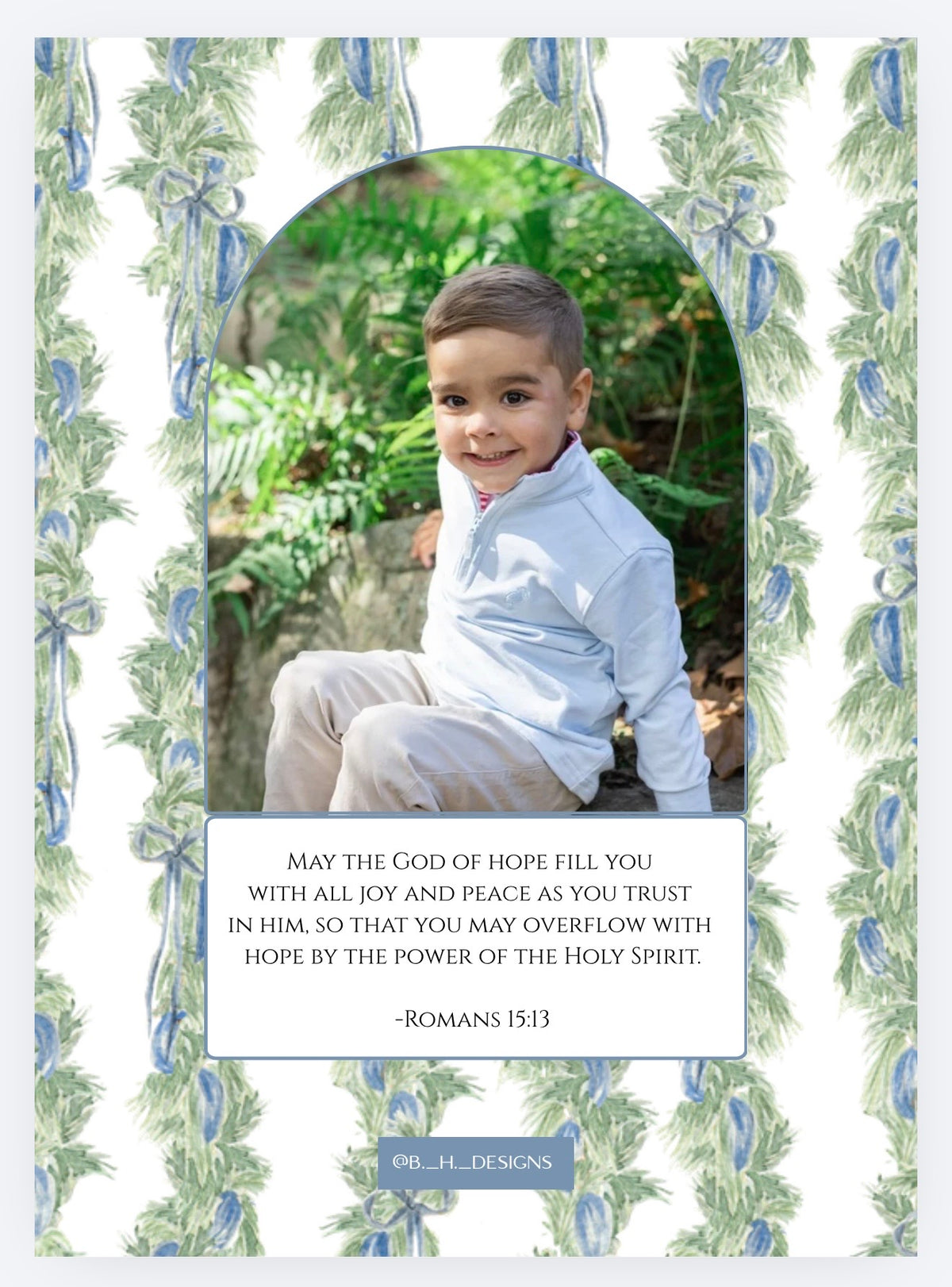 Coordinating greenery and blue ribbon Christmas card back with photo and Romans 15:13