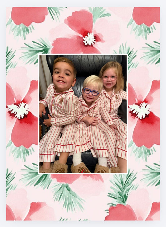 Coordinating pink and red watercolor floral Christmas card back with photo