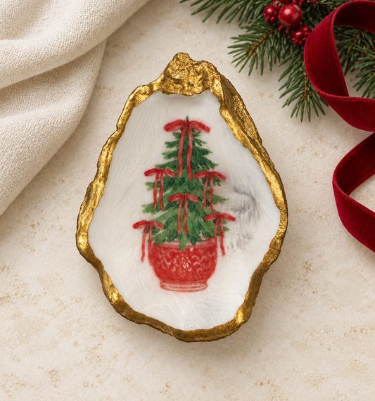 Gold-edged oyster with a green Christmas tree, red bows and red planter