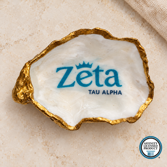 Zeta Tau Alpha Oyster with Affinity Licensed Product seal in the bottom-right corner